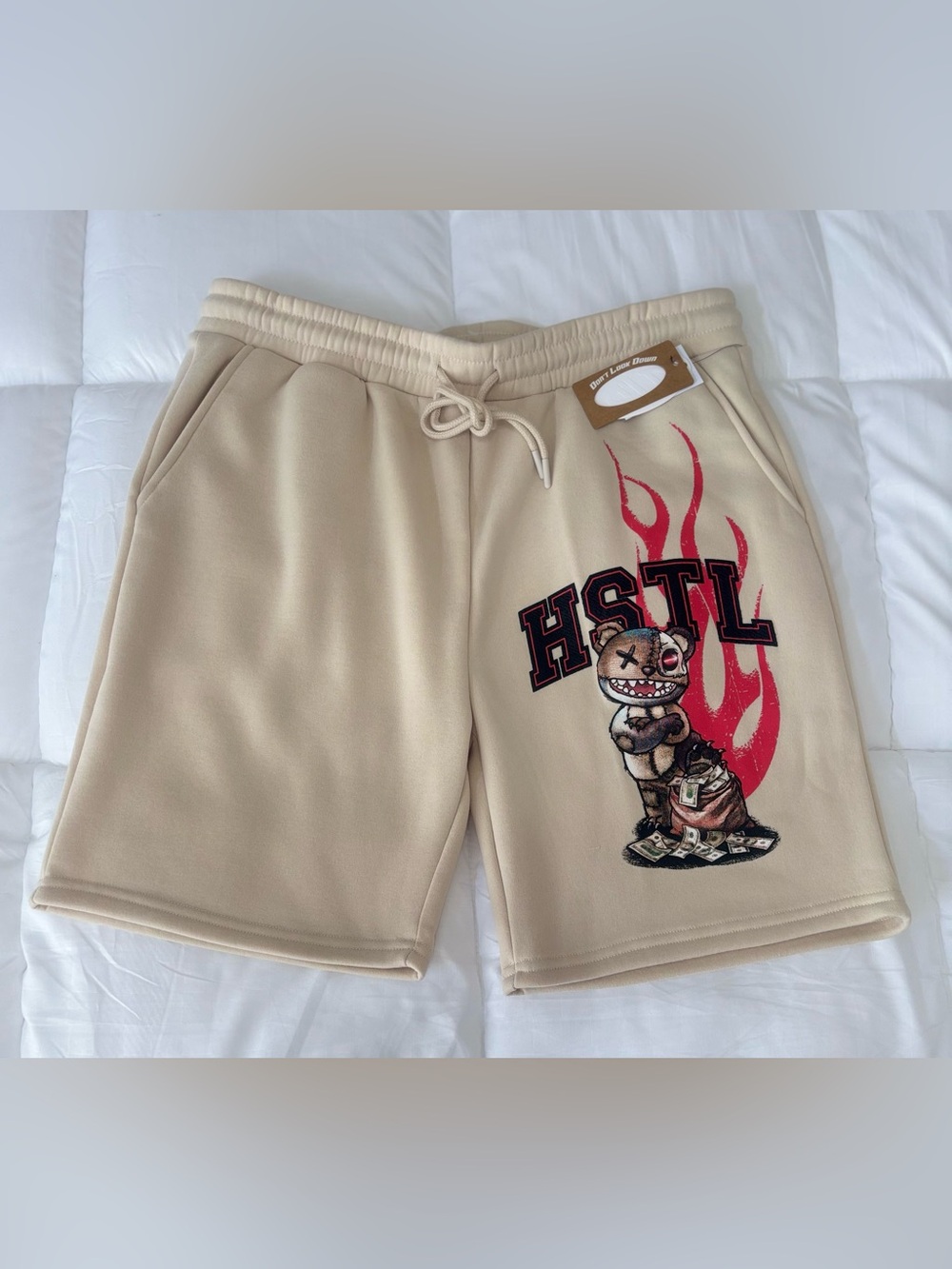 Beige Men’s Athletic Drawstring Shorts with Flame Teddy Graphic